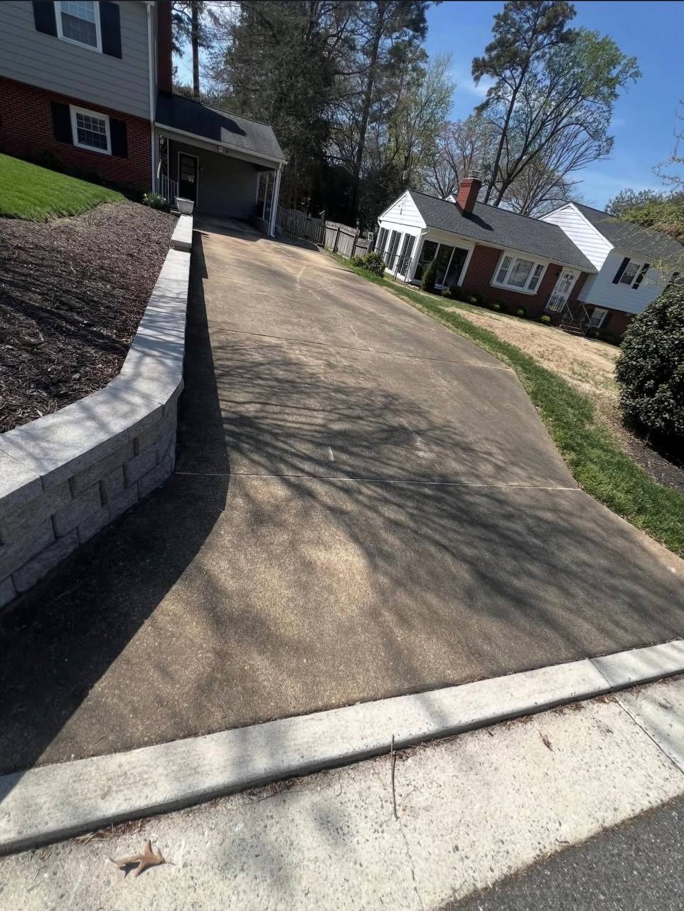 Driveway before pressure washing