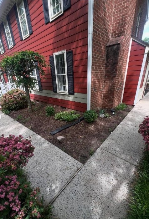 Clean walkway and entry path after pressure washing